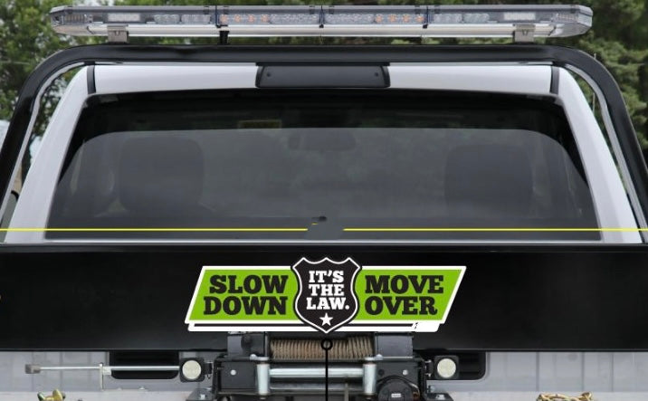 50" X 15" Slow Down Move Over It's The Law Vinyl - GREEN