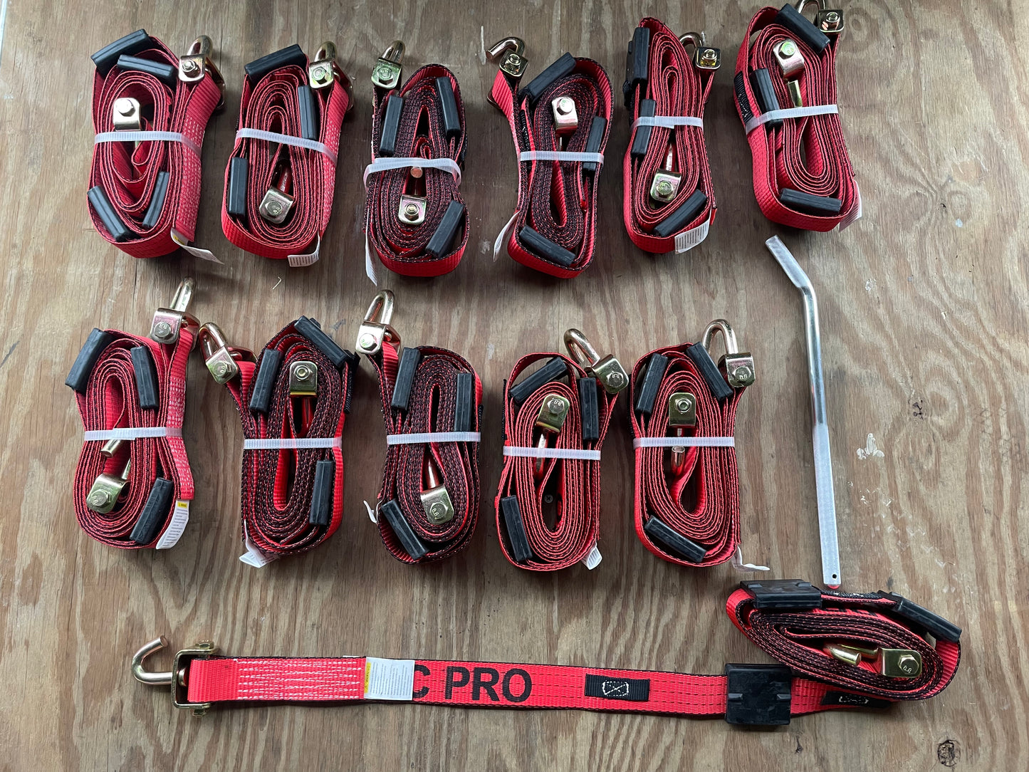 12pk Red Tecnic 18,000lb rated Swivel J straps with Rubber Cleats and 1 18” Tie Down bar