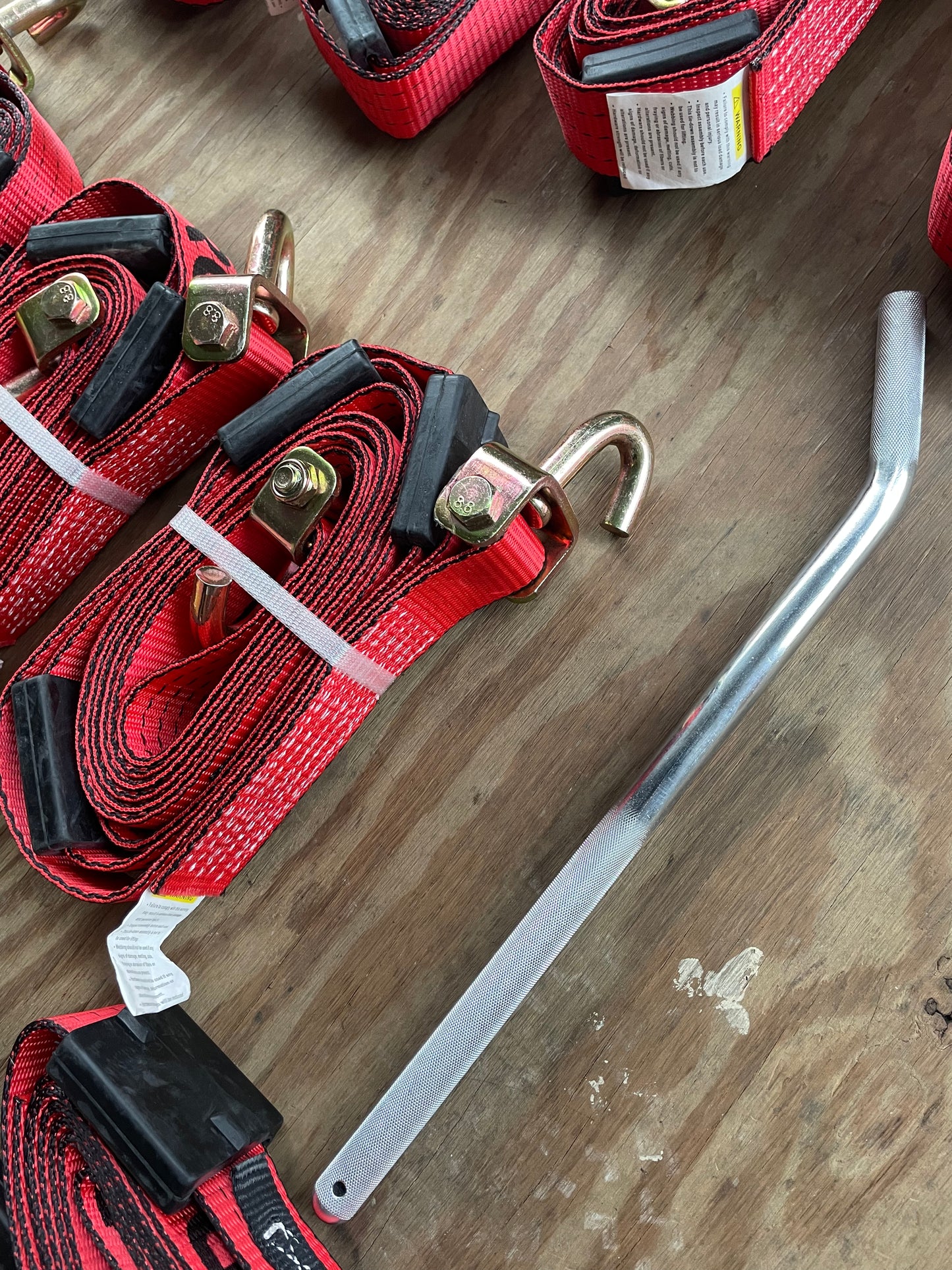 12pk Red Tecnic 18,000lb rated Swivel J straps with Rubber Cleats and 1 18” Tie Down bar